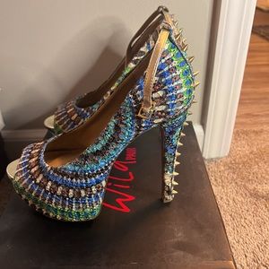 Wild pair multi color spiked heels size 8